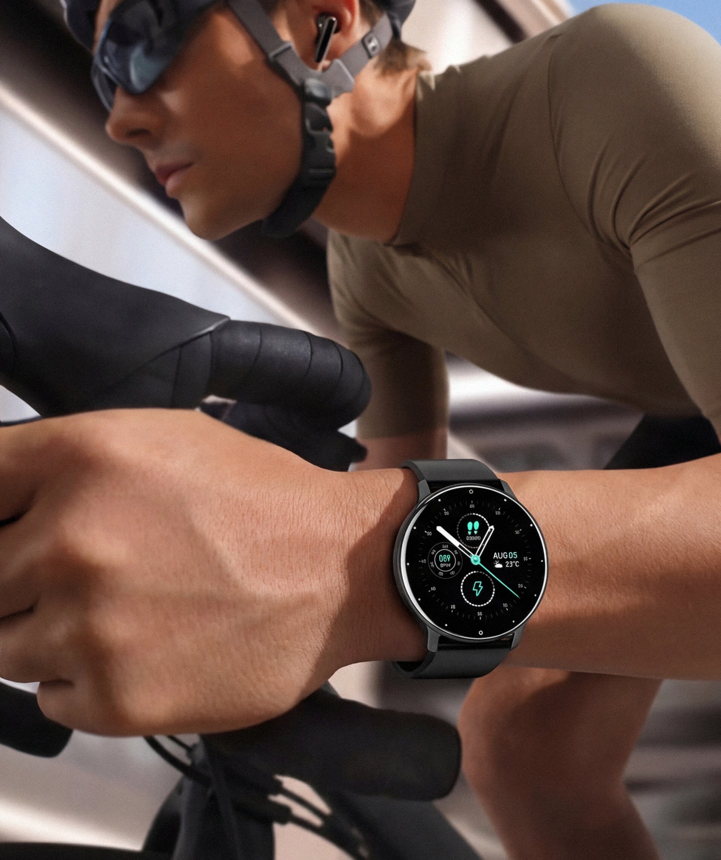 Person riding a bicycle wearing a smartwatch with a blurred background